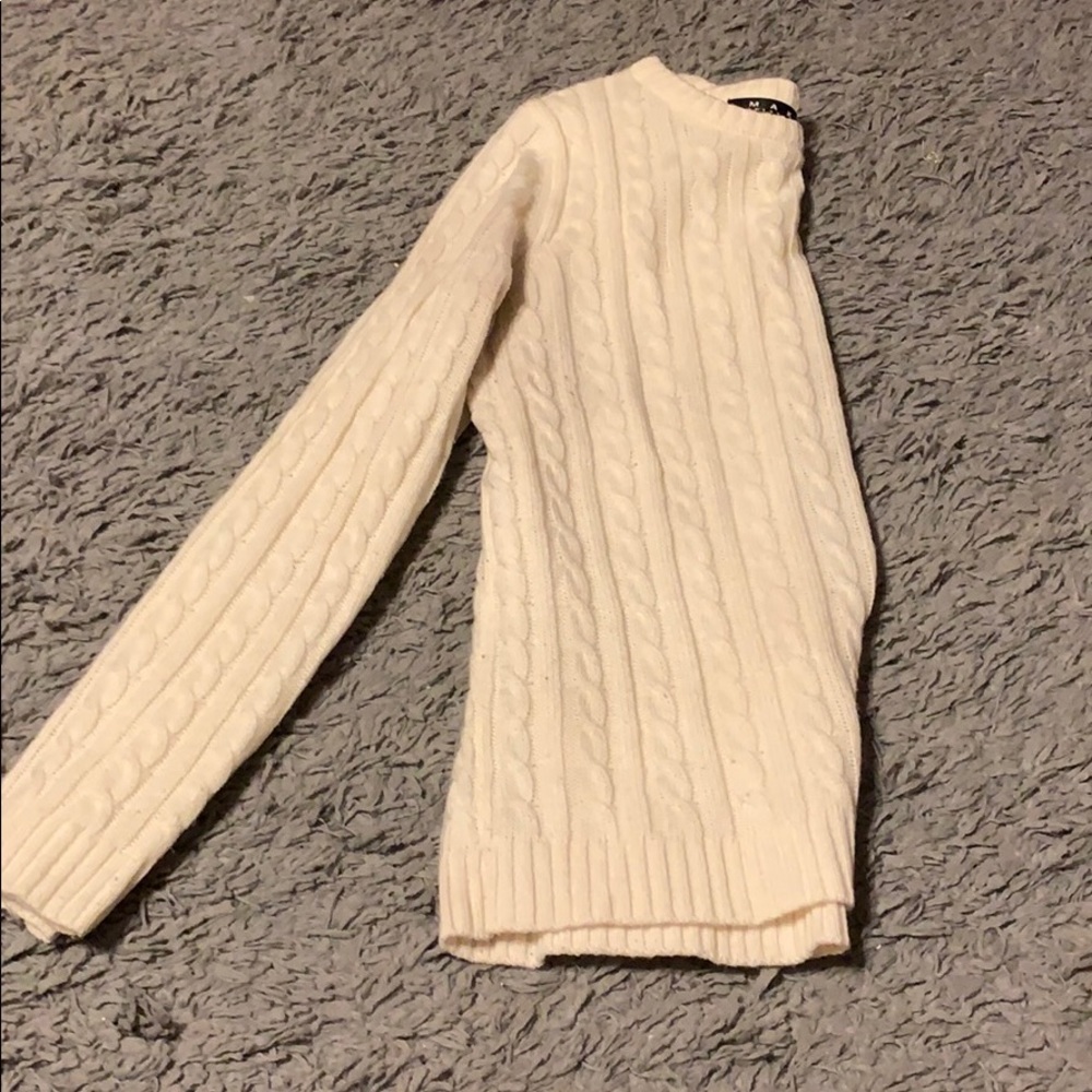 Ivory/ cream colored knit sweater.